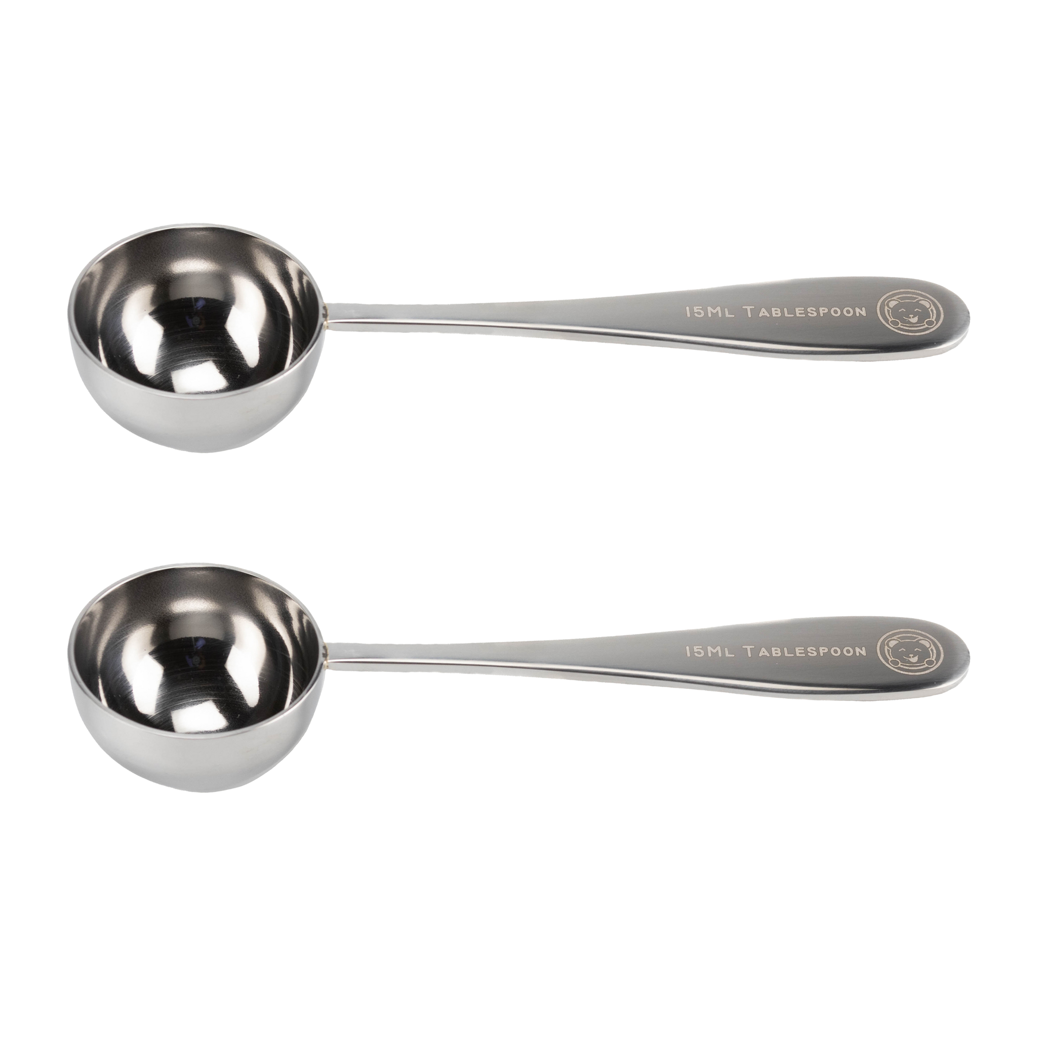 Is the plastic spoon 1 tablespoon? Or is the metal one about 2